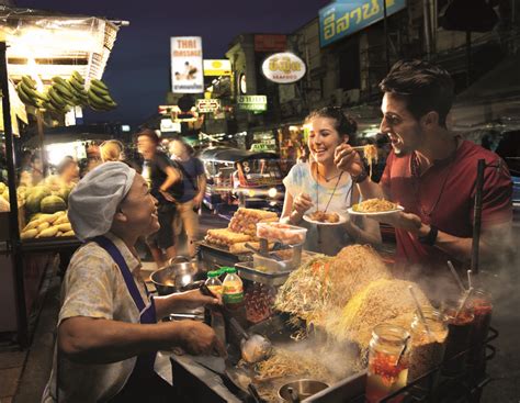 Embark on an Exciting Culinary Journey through the Lively Streets of Thailand
