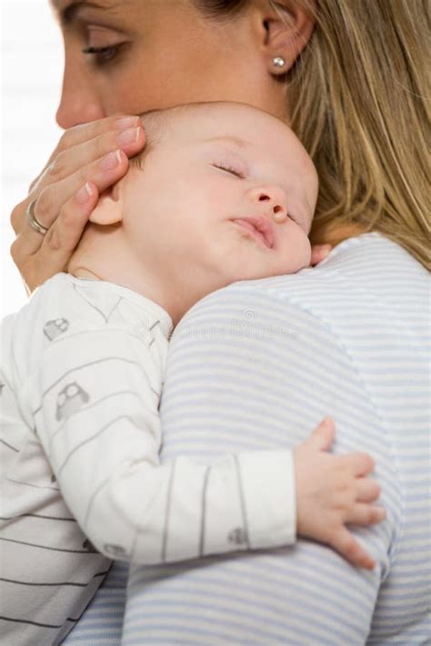 Factors Influencing Dreams about Embracing a Male Infant