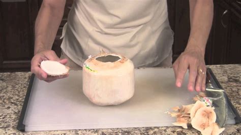 Tools and Techniques for Opening a Juvenile Coconut